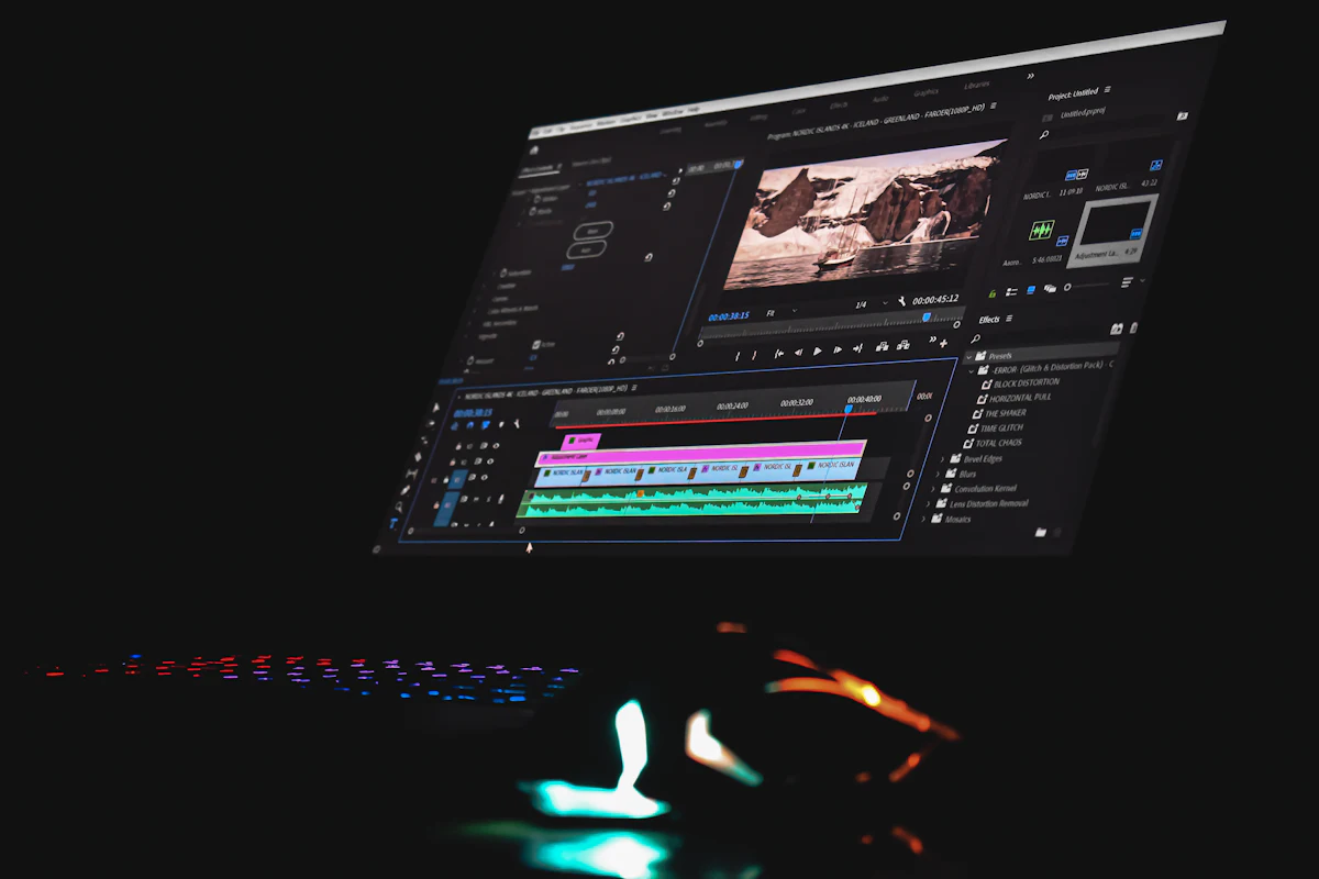 Editing software open on a screen in a dark room